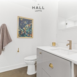 Indulge in luxury self-care in our polished bathrooms. 🛁✨ With premium fixtures and a serene ambiance, every day feels like a spa day.  #TheHallLofts #WeAreFlats #FlatsLife #NorthLoopMN #MinneapolisMN #ApartmentTherapy #LuxuryLiving #BathroomGoals #SelfCare #LuxuryBathroom